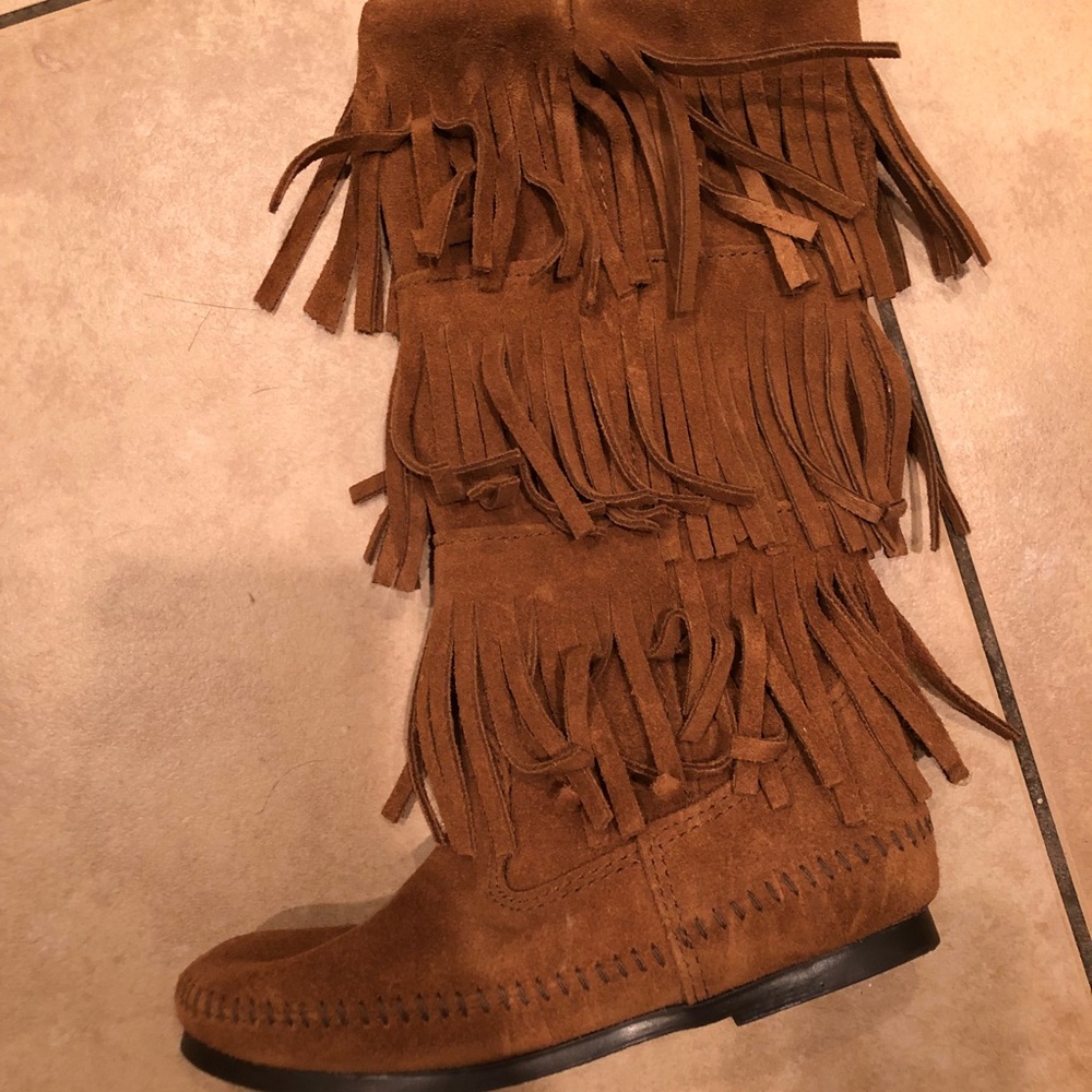 Minnetonka 3 layer fringe boot.  Never worn